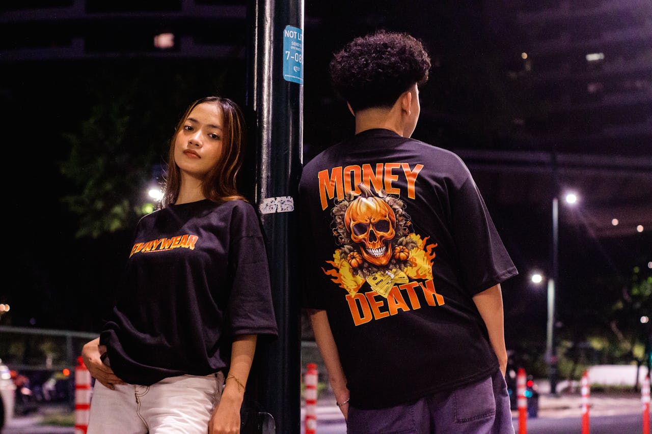 Modern streetwear fashion captured in an urban nighttime setting.